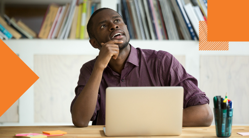 African American office worker looking away thinking of problem